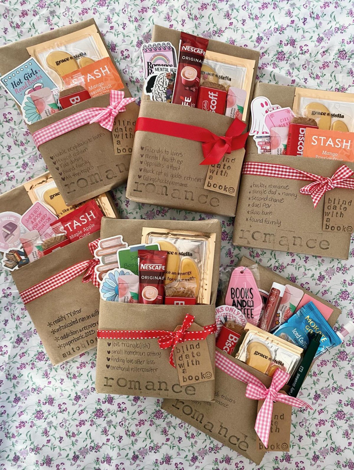 Brown paper gift envelopes with ribbons containing coffee, cookies, and book-themed treats.