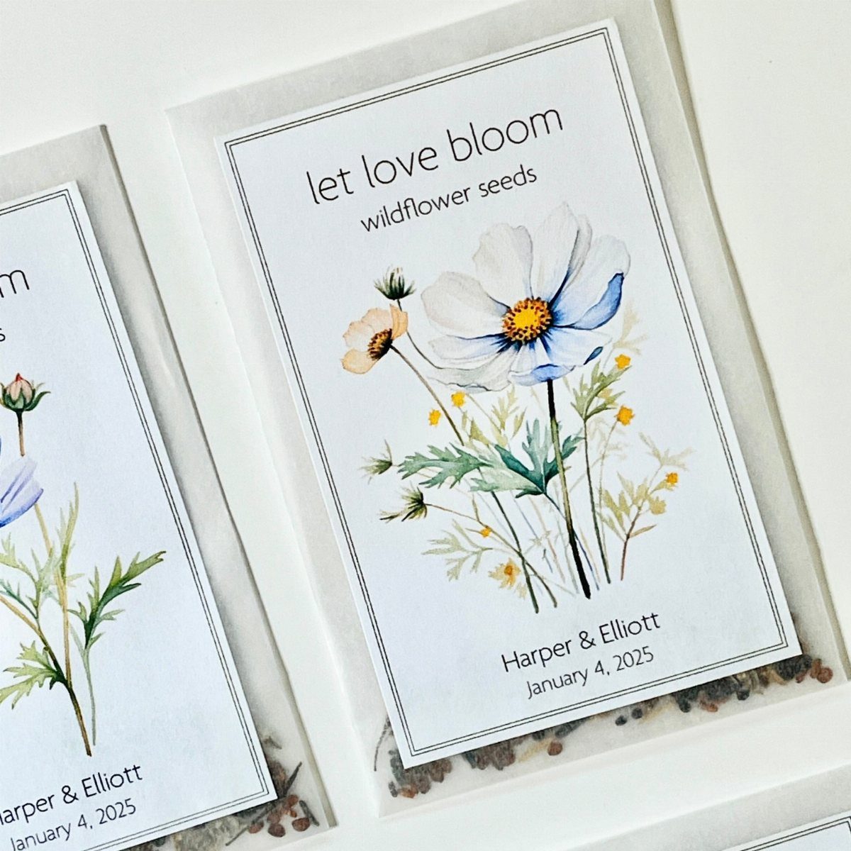 Seed packets with wildflower illustrations and personalized text for a bridal shower.