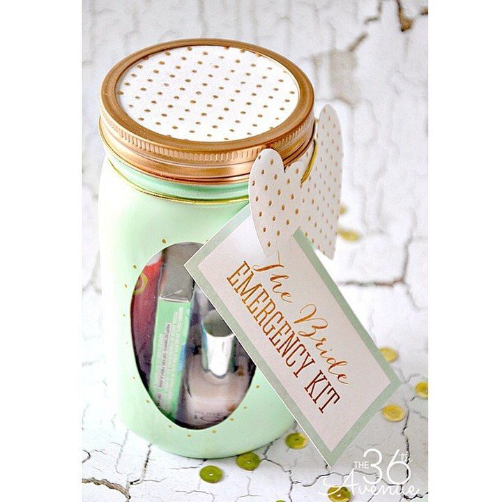 Light green mason jar emergency kit for a bride with a white tag.