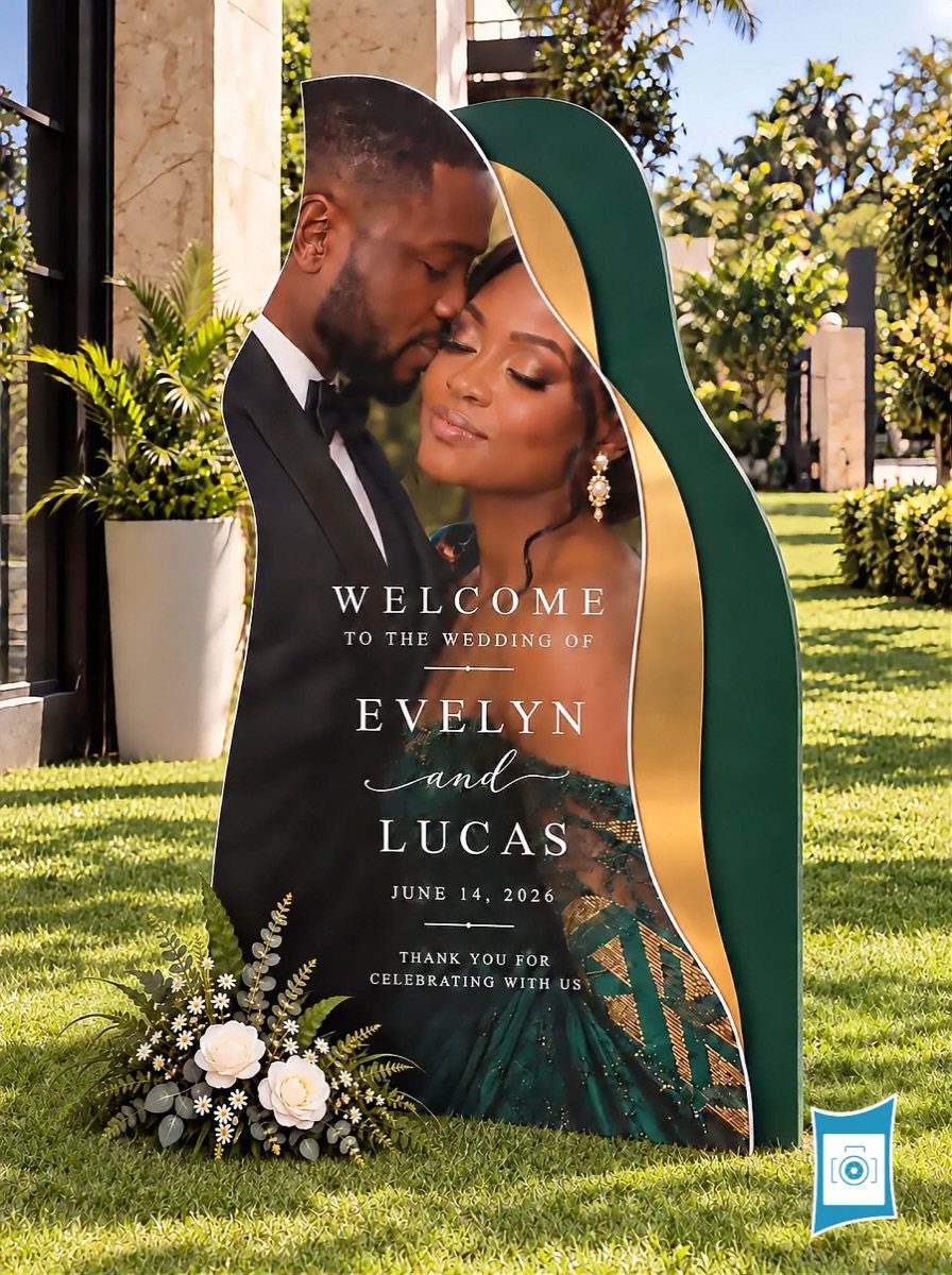 Wedding welcome sign with a couple, featuring emerald green and gold accents.