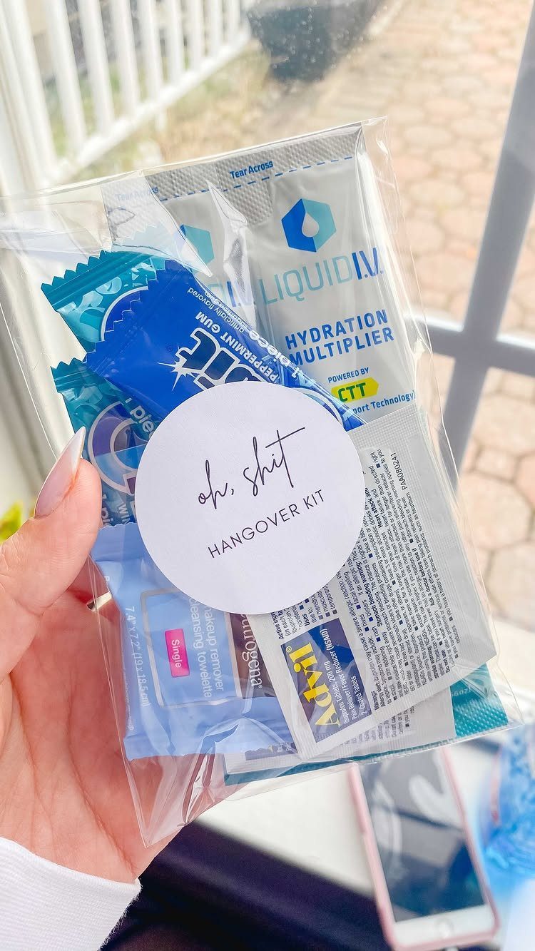 Hangover kit in a clear bag with hydration packets and peppermint gum.